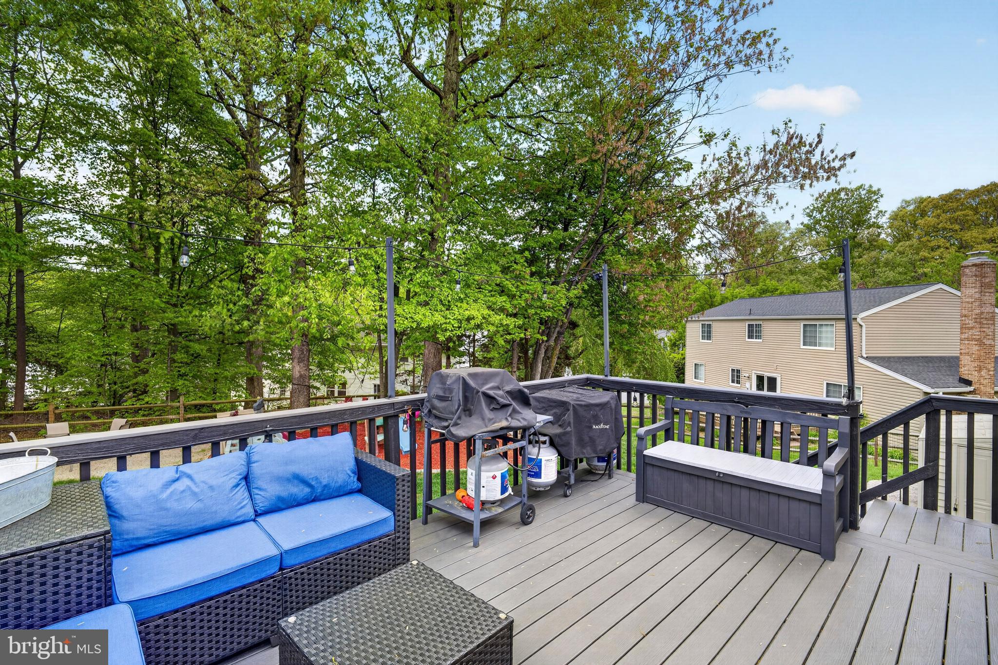 8373 Magic Leaf Road Springfield, VA 22153 - Photo 64 of 69 a view of a wooden deck with furniture