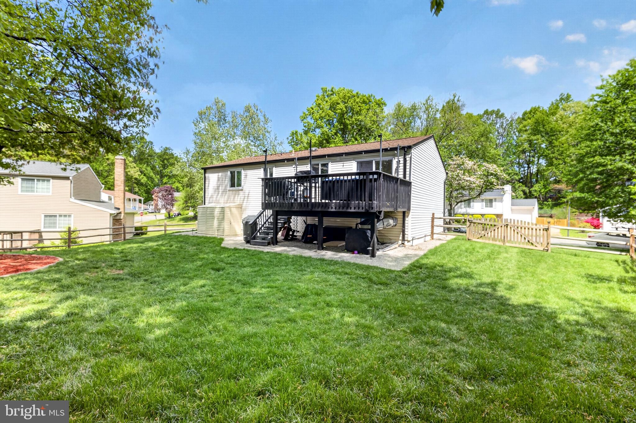 8373 Magic Leaf Road Springfield, VA 22153 - Photo 10 of 69 a view of backyard with deck and garden