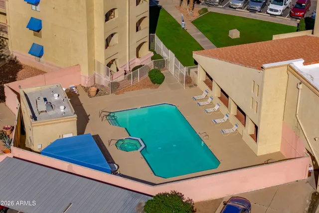 a front view of a house with large windows