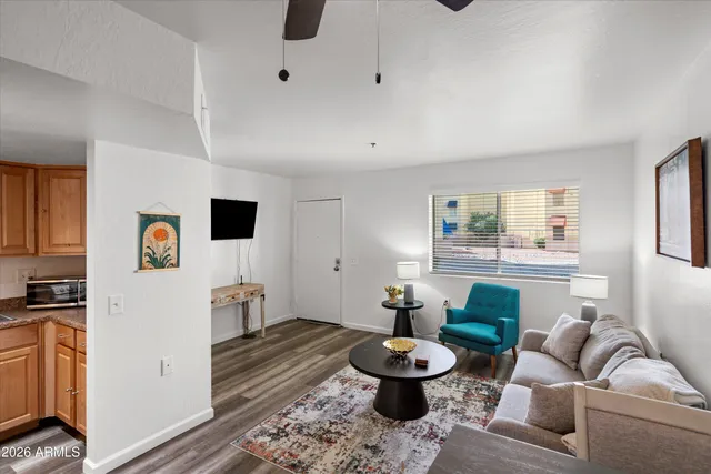 aerial view of a backyard with table and chairs