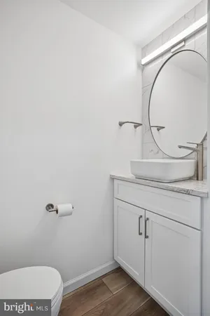 a view of room with window and hardwood floor