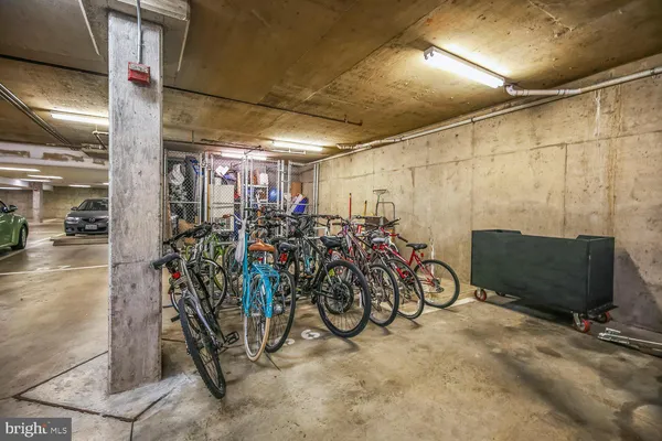 a swimming pool with outdoor seating and yard