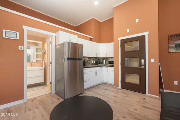a bathroom with a bathtub and a sink