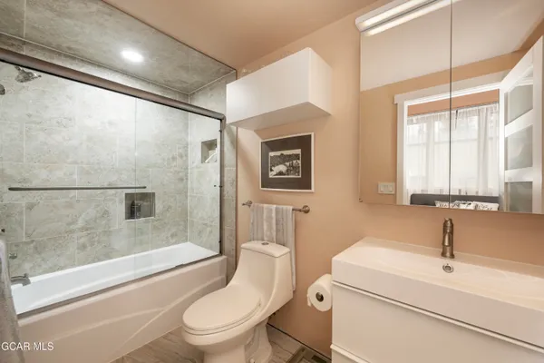 a view of a kitchen with washer and dryer