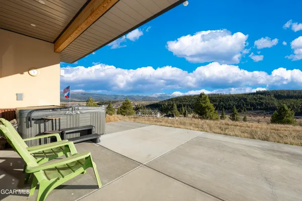 a view of a living room with furniture
