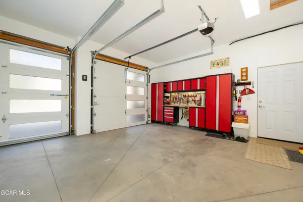 a view of a street with a building in the background