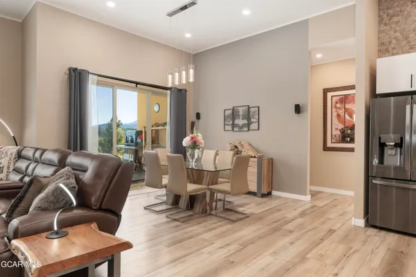 a view of a swimming pool with a terrace