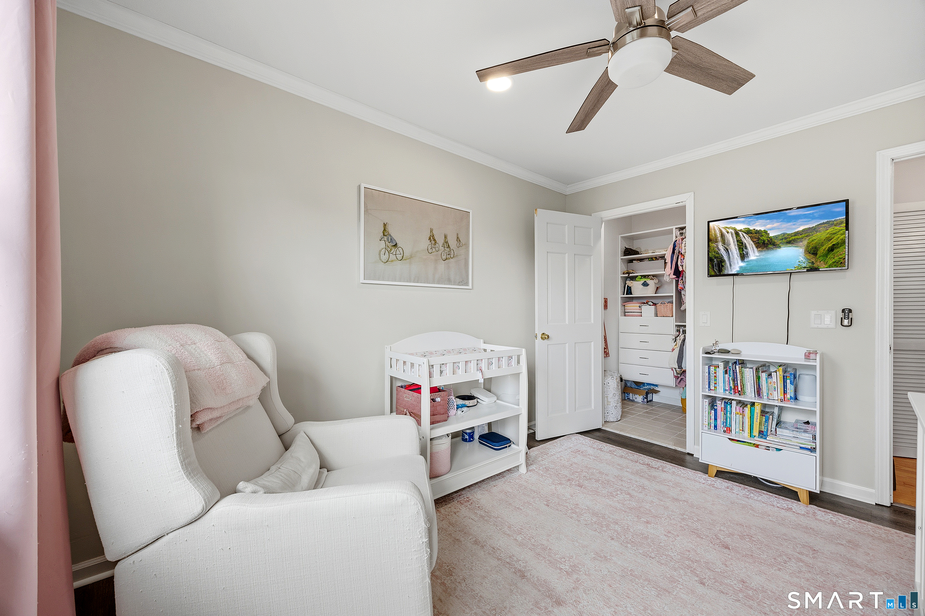 55 Mill Plain Road, Unit 121 Danbury, CT 06811 - Photo 21 of 33 The large closet has built-in drawers and shelves and also a little surprise. Inside the closet are hookups for a washer/dryer in case you wish to have access to a washer/dryer on the bedroom level!