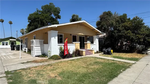 front view of a house with a patio