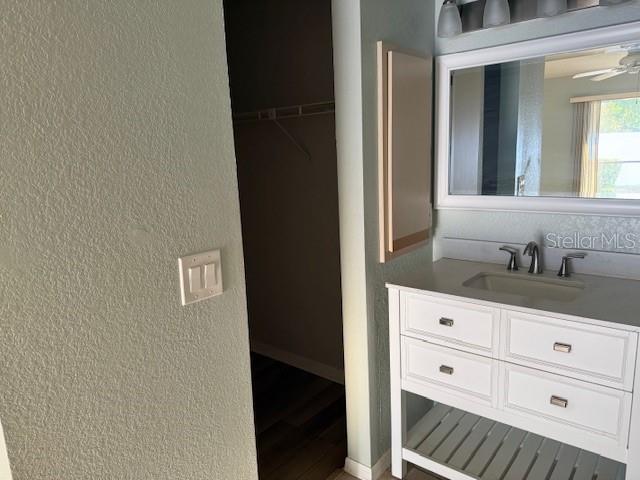 24540 Harbor View Road, Unit H2 Punta Gorda, FL 33980 - Photo 11 of 21 a bathroom with a sink and a mirror