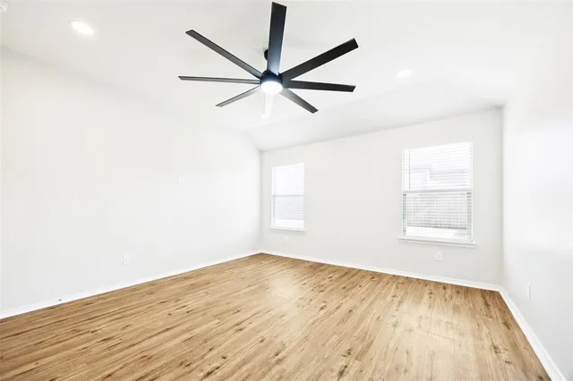 a view of a big room with wooden floor