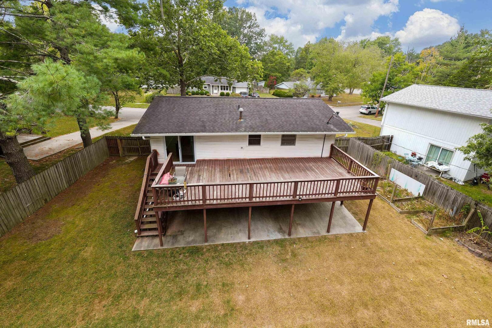309 South Plover Drive Carbondale, IL 62901 - Photo 24 of 29 a view of a house with a yard balcony and sitting area