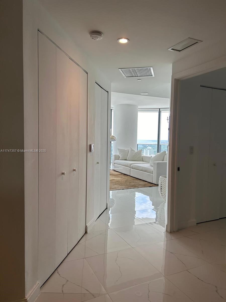 45 Southwest 9th Street, Unit 3306 Miami, FL 33130 - Photo 14 of 21 a bathroom with a shower and a sink