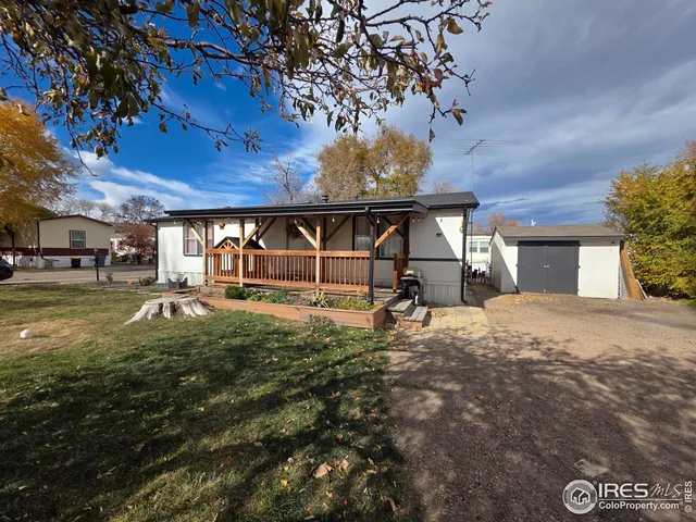 a house view with a backyard space