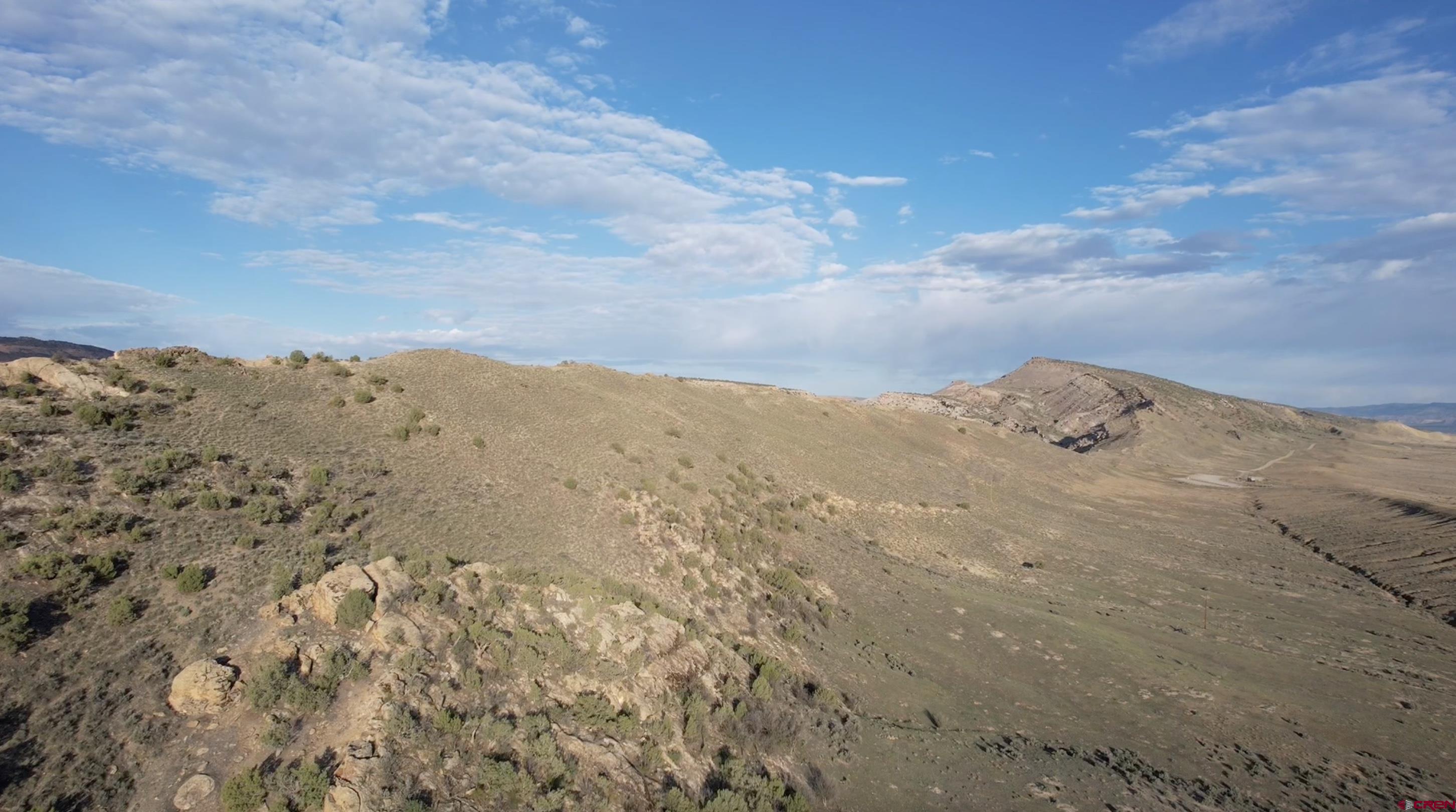 a view of mountain view with mountains in the background