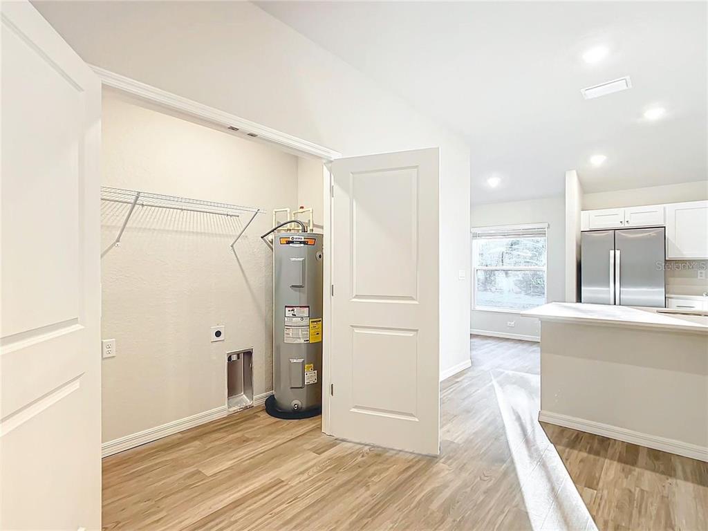 3070 East Odier Street Inverness, FL 34453 - Photo 14 of 14 a view of empty room with wooden floor and windows