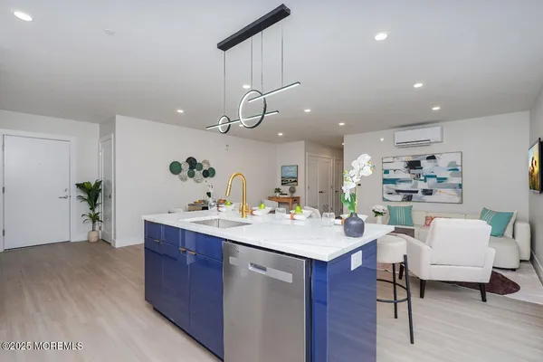 a kitchen with a sink cabinets and window