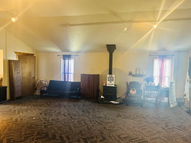 a view of a livingroom with furniture