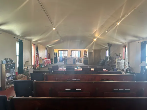 a view of a dining room with furniture