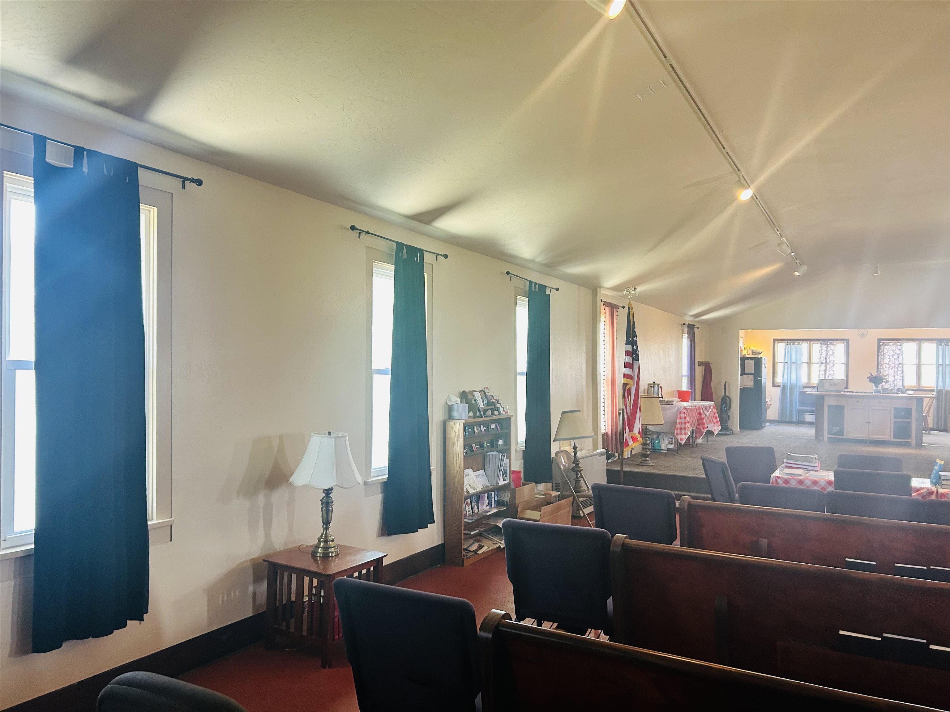 49067 KE Road Mesa, CO 81643 - Photo 27 of 31 a living room with furniture and a lamp