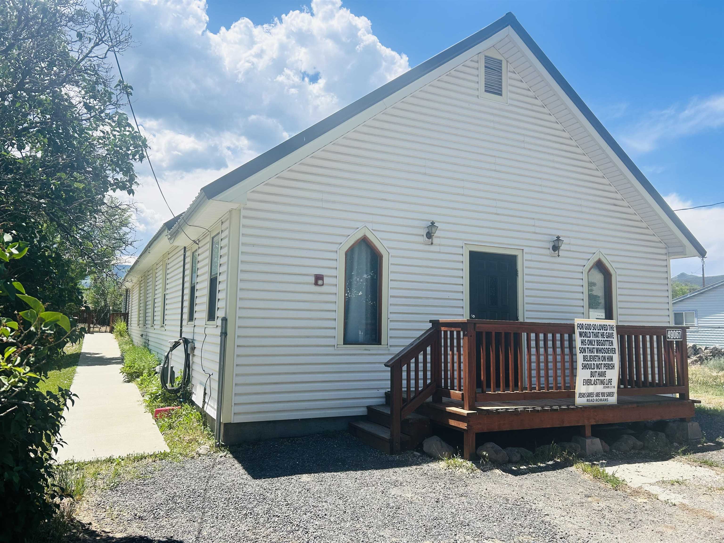 49067 KE Road Mesa, CO 81643 - Photo 3 of 31 a view of a house with a yard