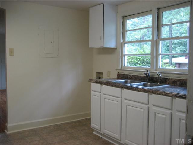 1218 Platinum Avenue Raleigh, NC 27610 - Photo 5 of 13 a kitchen with sink and window