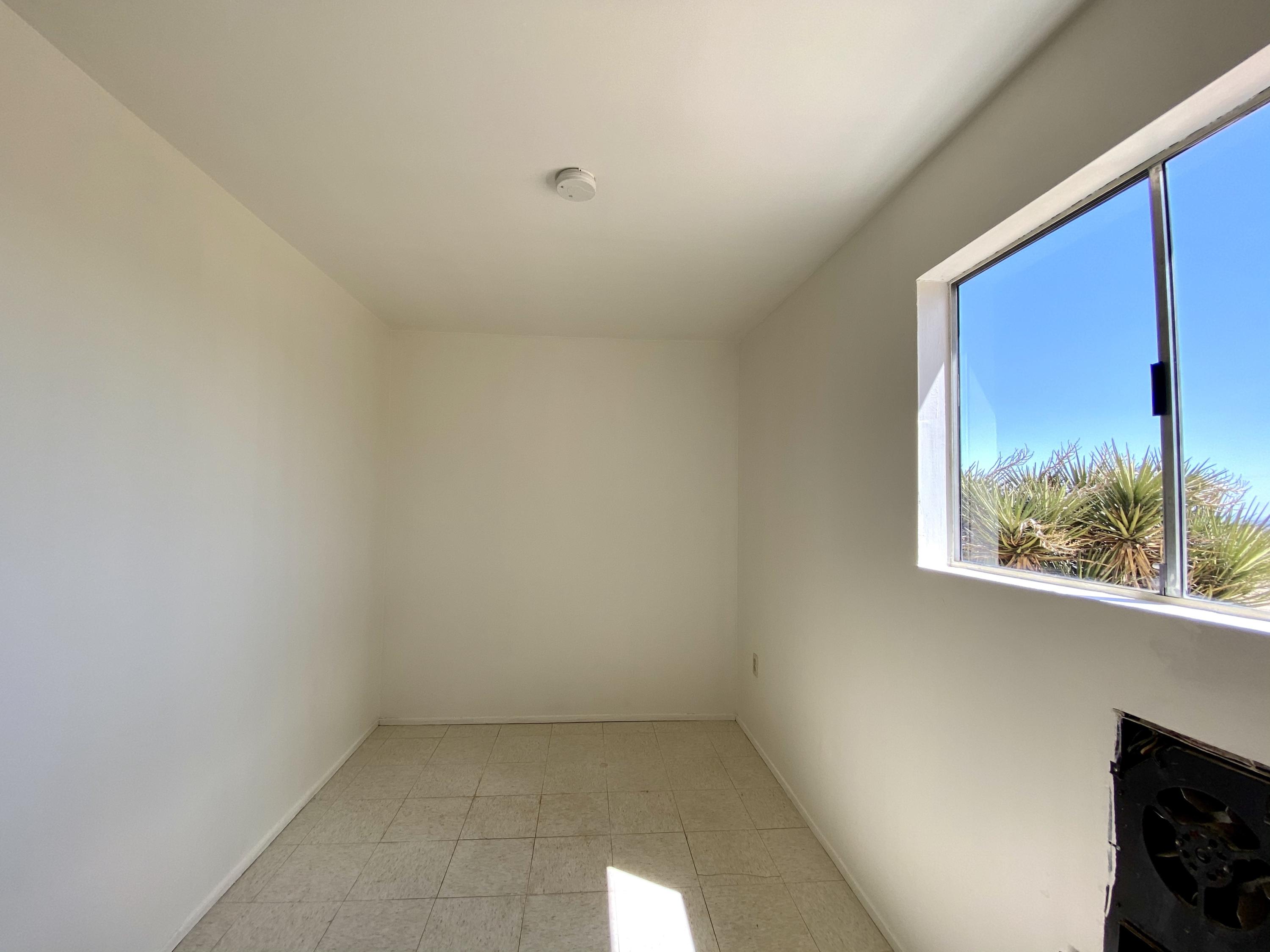 55150 Gleason Road Landers, CA 92285 - Photo 14 of 17 a view of a small space with a window