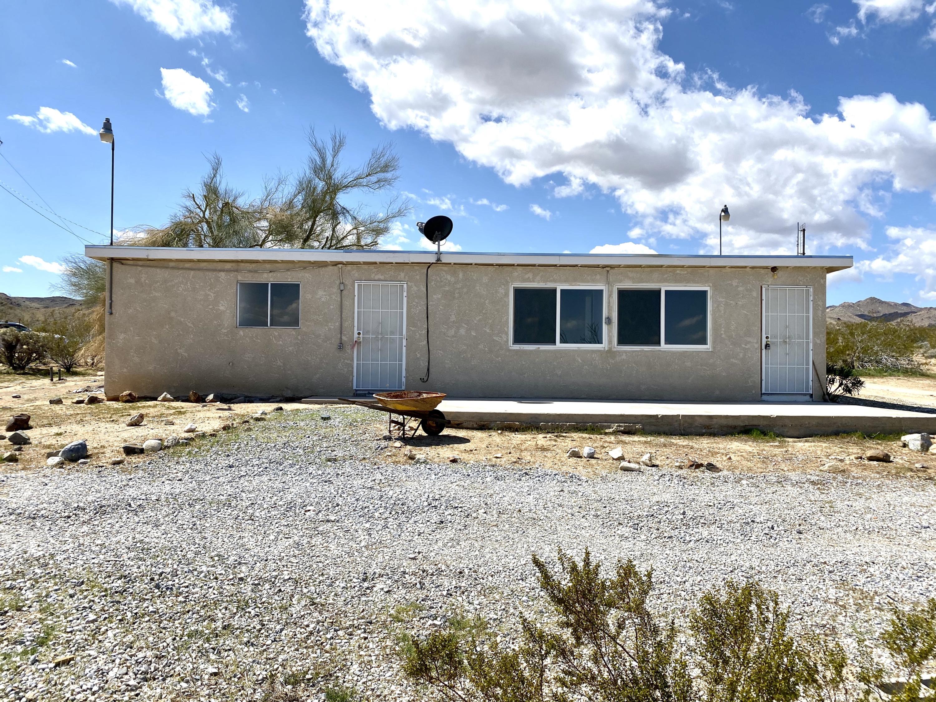 55150 Gleason Road Landers, CA 92285 - Photo 4 of 17 a view of a house with a snow
