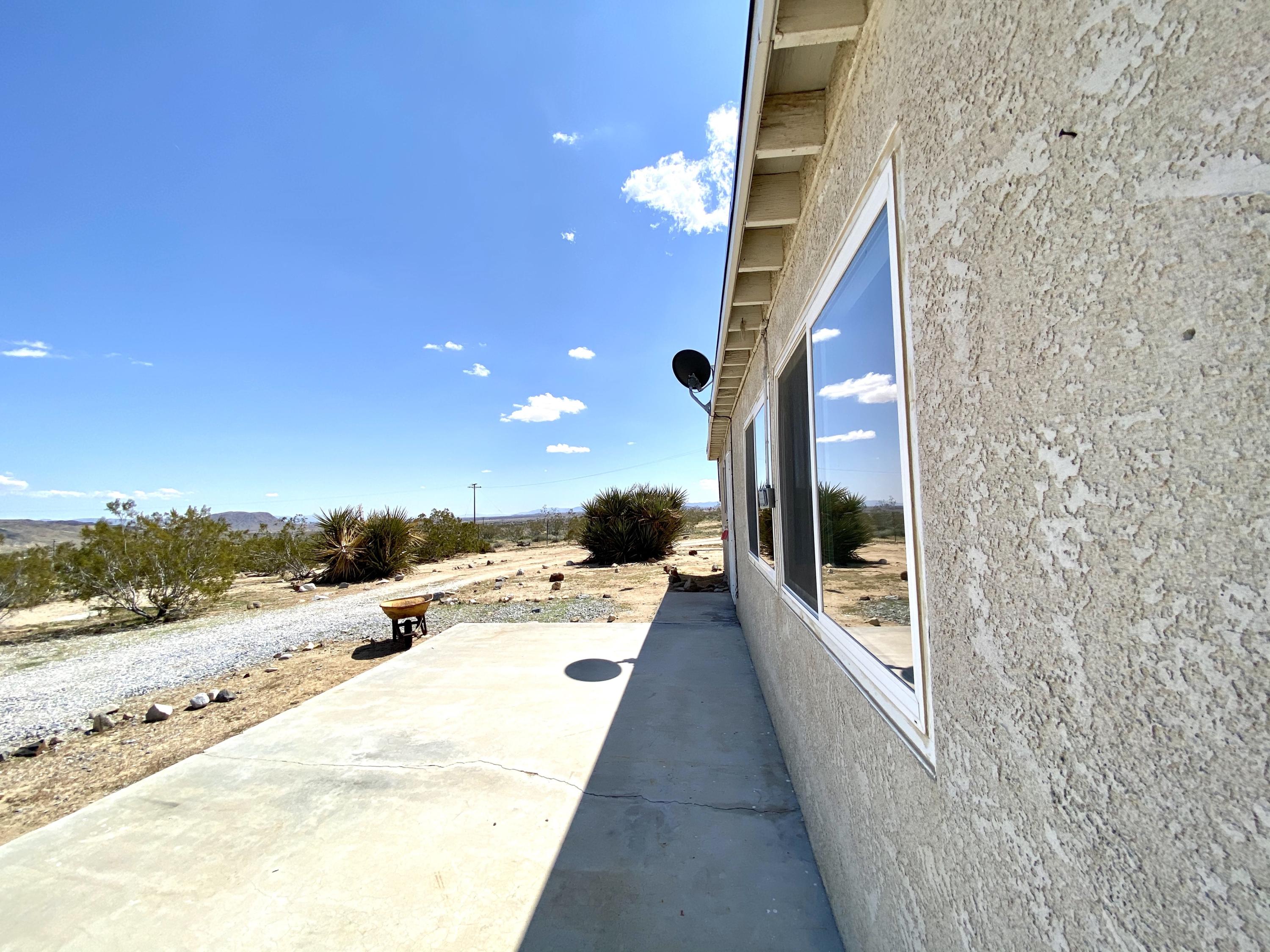 55150 Gleason Road Landers, CA 92285 - Photo 5 of 17 a view of a hall with wooden floor