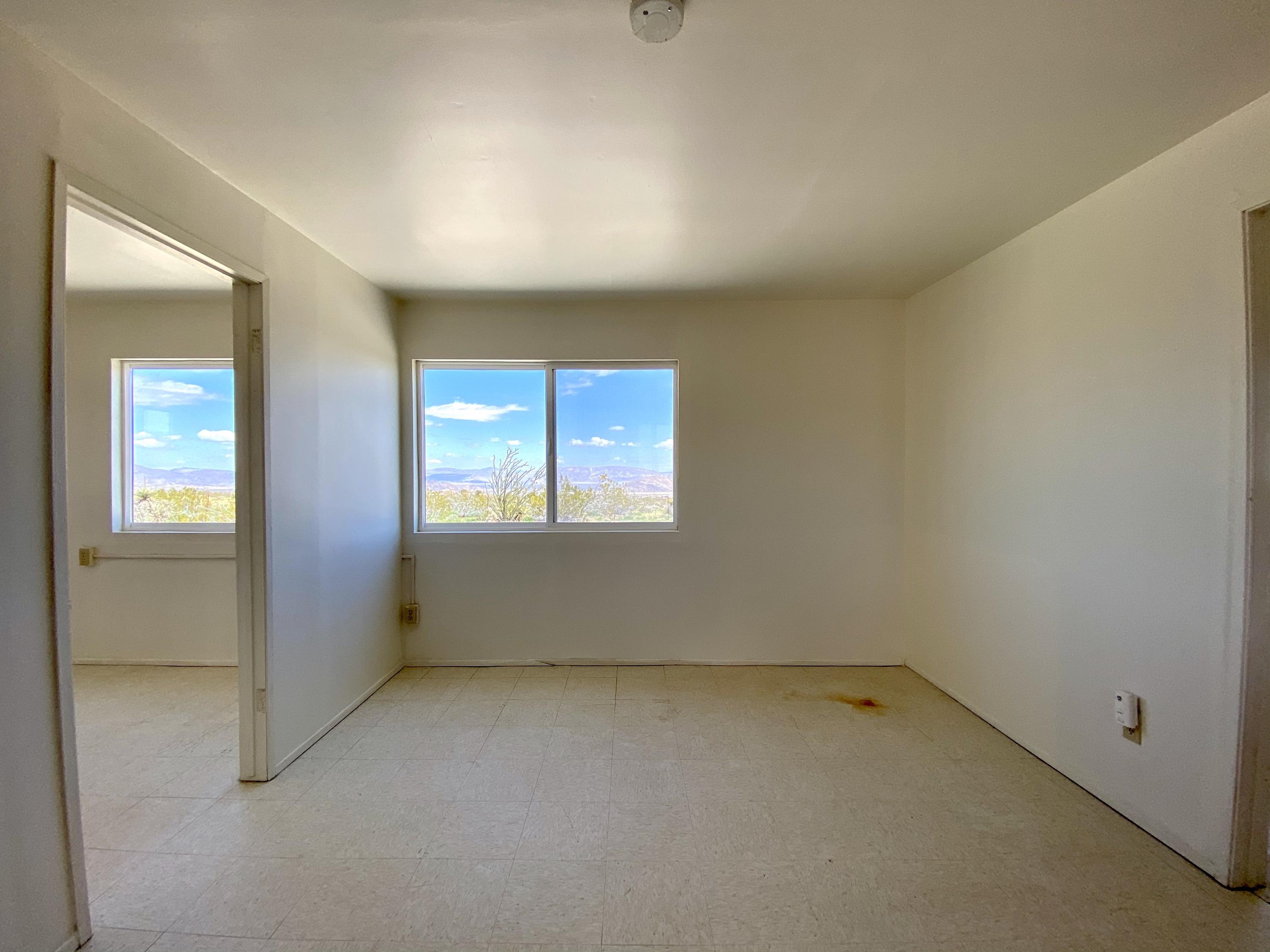 55150 Gleason Road Landers, CA 92285 - Photo 8 of 17 an empty room with windows