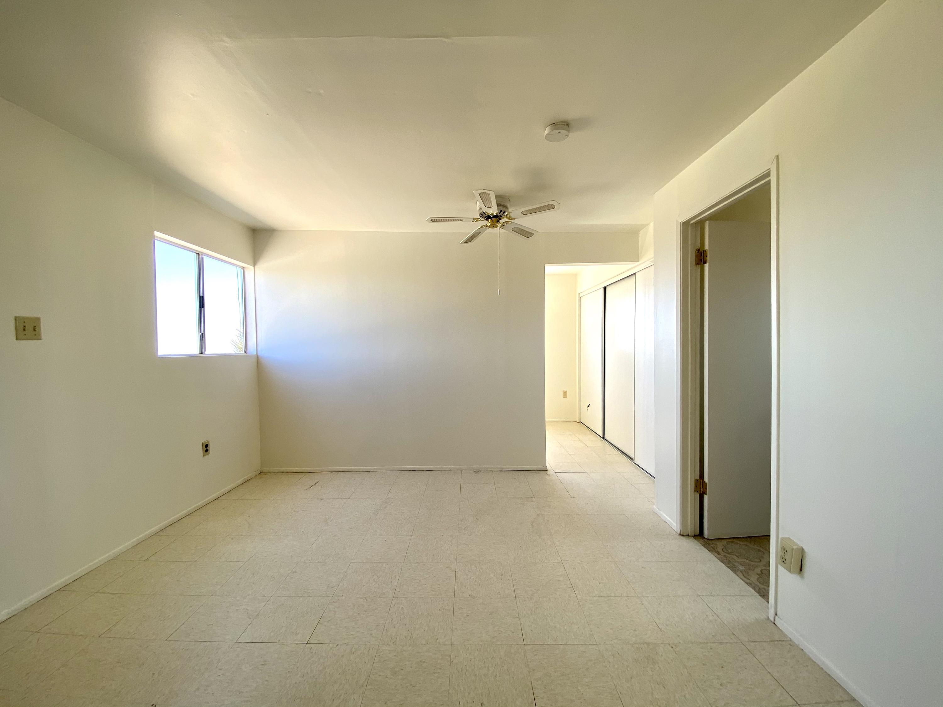 55150 Gleason Road Landers, CA 92285 - Photo 9 of 17 an empty room with windows and closet