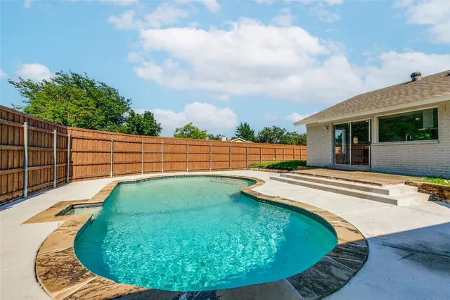 a view of outdoor space pool patio and deck