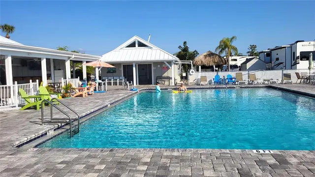 a front view of house with yard and seating area