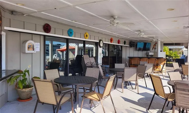 a dining room with furniture and window