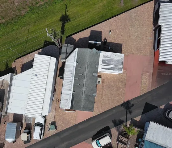 a terrace with outdoor seating and city view
