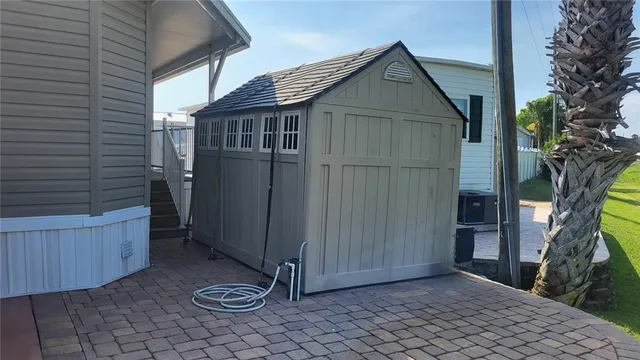 a view of backyard of the house