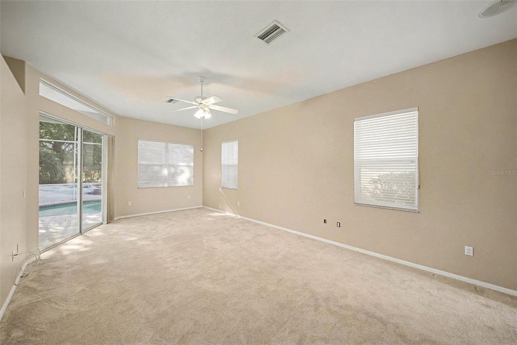 8402 Maybelle Drive Weeki Wachee, FL 34613 - Photo 25 of 41 an empty room with windows and closet