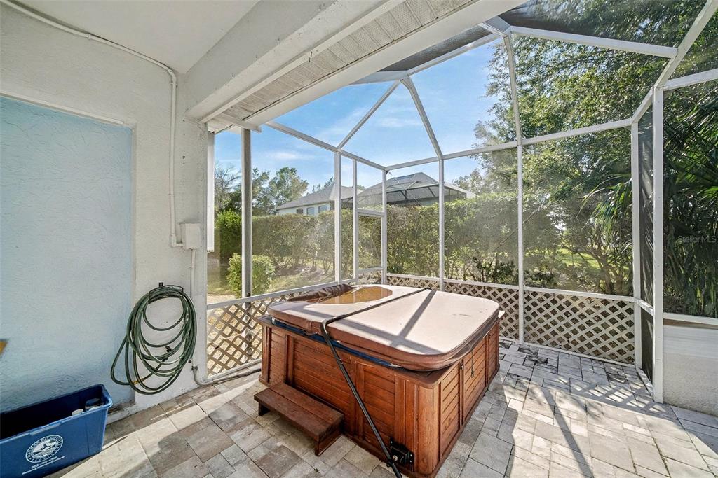 8402 Maybelle Drive Weeki Wachee, FL 34613 - Photo 30 of 41 a room with natural light and white walls