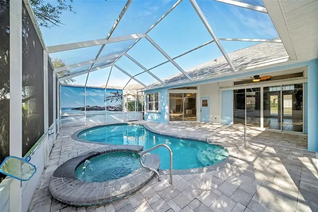 a view of a house with swimming pool