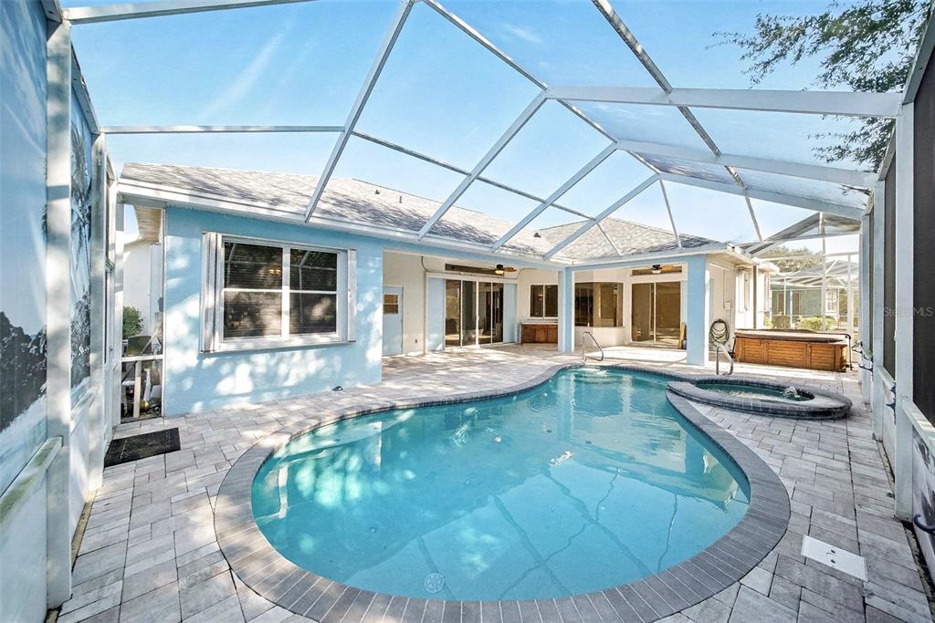 8402 Maybelle Drive Weeki Wachee, FL 34613 - Photo 33 of 41 a view of a house with swimming pool