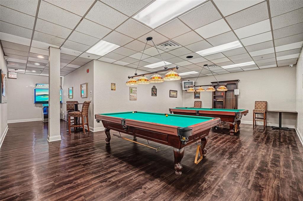 8402 Maybelle Drive Weeki Wachee, FL 34613 - Photo 55 of 56 a room with wooden furniture and pool table