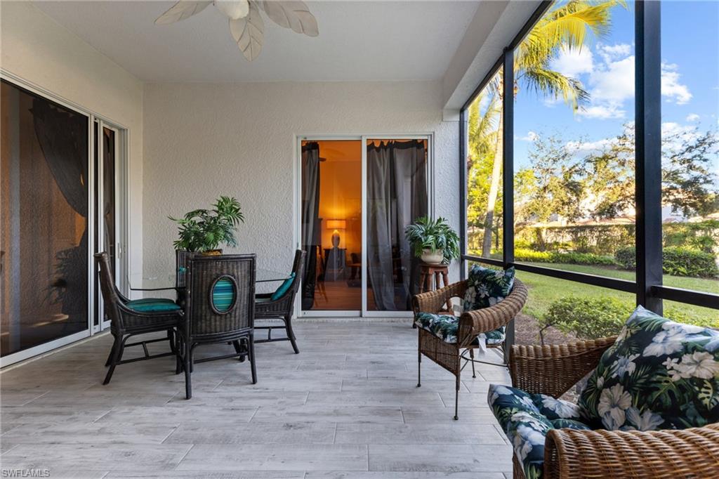 9079 Cascada Way, Unit 102 Naples, FL 34114 - Photo 21 of 49 a living room with furniture and a window