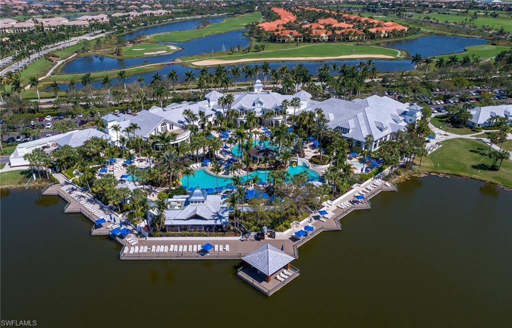 9079 Cascada Way, Unit 102 Naples, FL 34114 - Photo 44 of 49 an aerial view of a house with a lake view