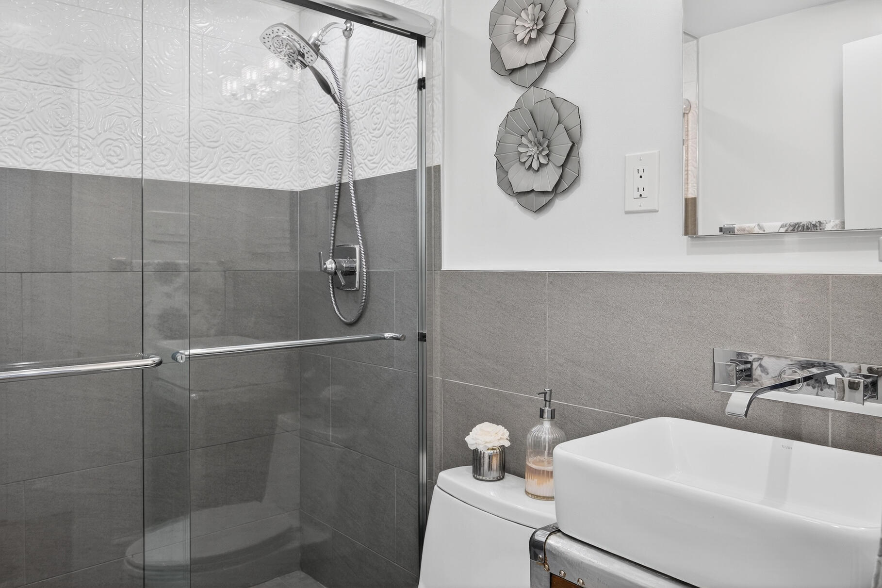 15 Geraldine Road Cotuit, MA 02635 - Photo 13 of 27 a bathroom with a toilet and a shower