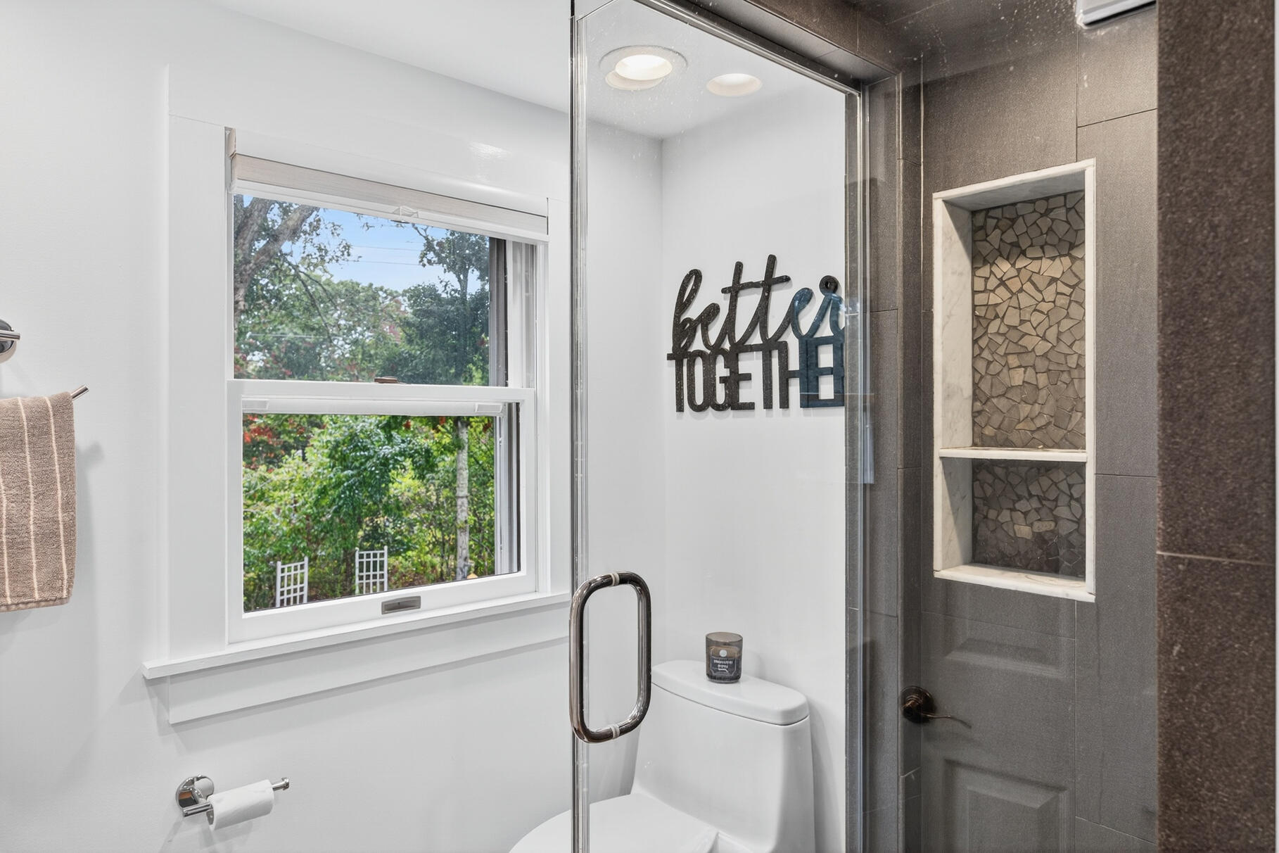 15 Geraldine Road Cotuit, MA 02635 - Photo 15 of 27 a bathroom with a shower sink and mirror