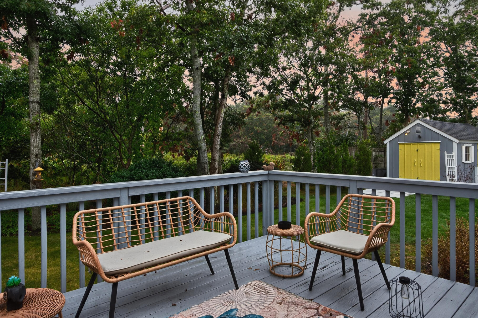 15 Geraldine Road Cotuit, MA 02635 - Photo 18 of 27 a view of a two chairs in the deck