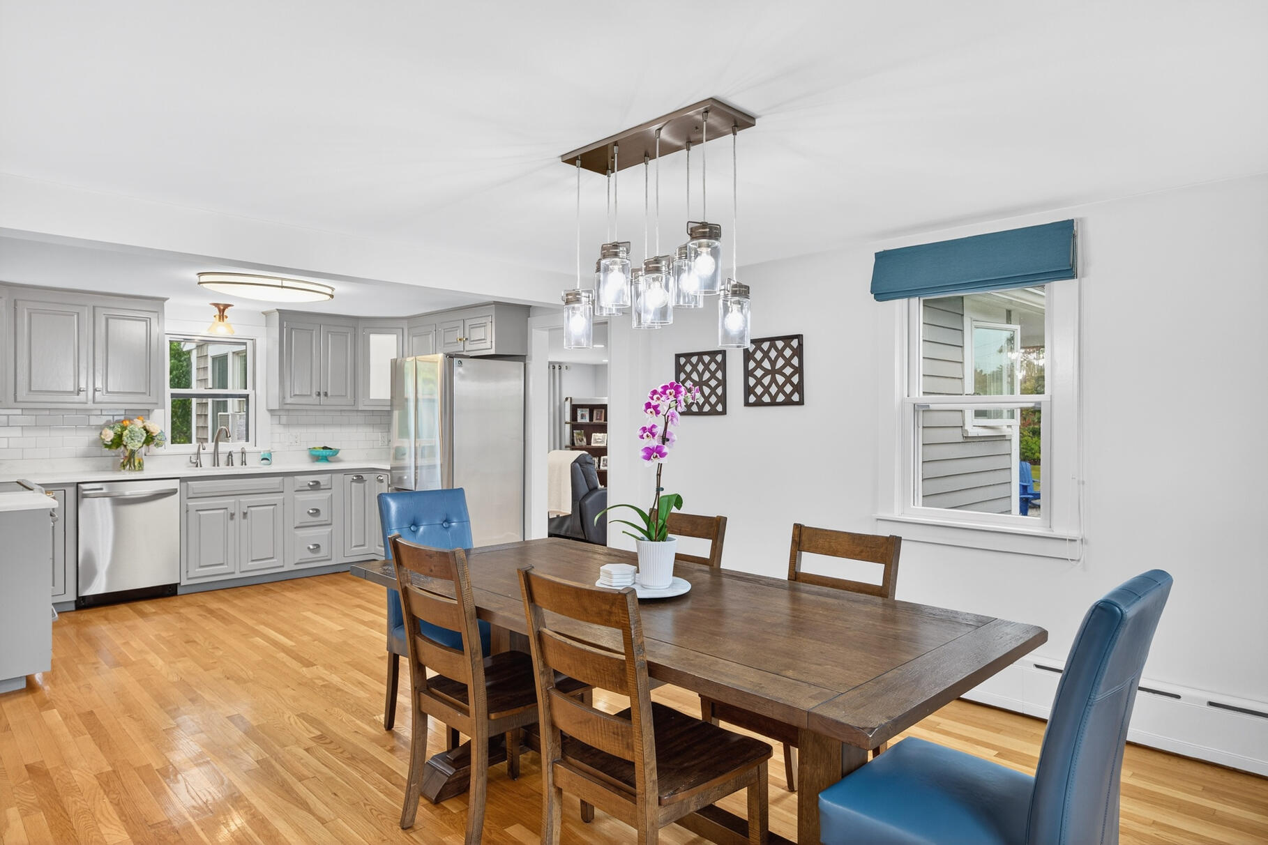 15 Geraldine Road Cotuit, MA 02635 - Photo 5 of 27 a view of a dining room with furniture window and wooden floor