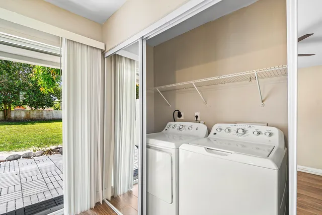 a utility room with dryer and washer
