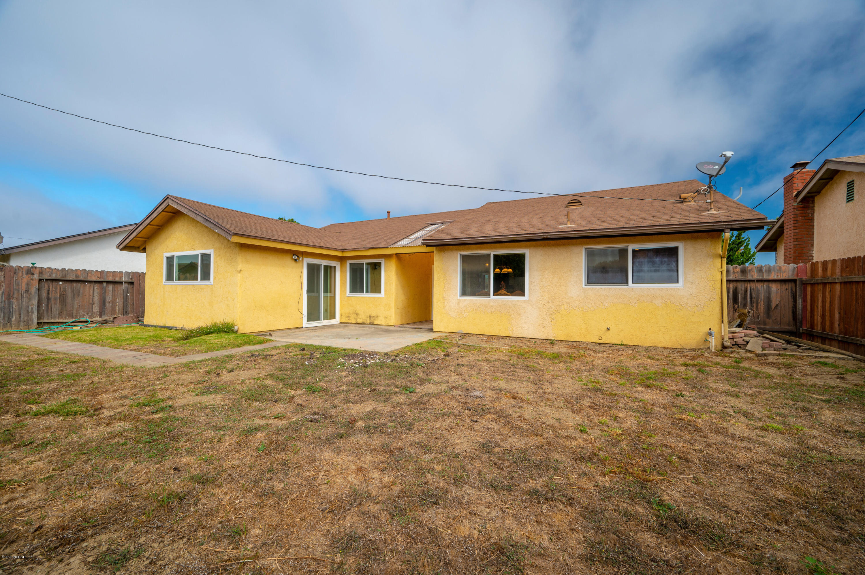 1008 West Anthony Way Lompoc, CA 93436 - Photo 24 of 26 a view of a house with backyard