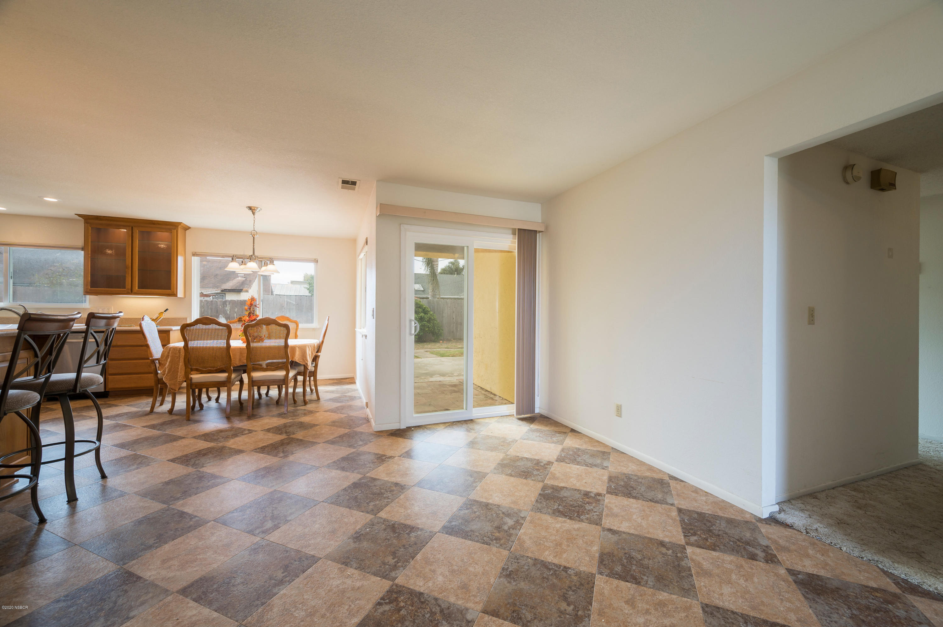1008 West Anthony Way Lompoc, CA 93436 - Photo 6 of 26 a living room with furniture and large windows